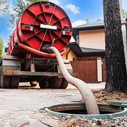 Septic pumping truck on site