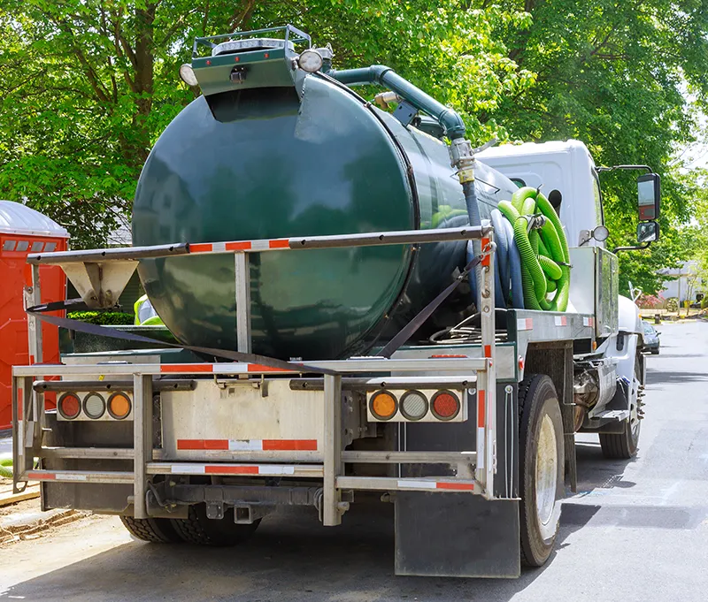 vacuum waste truck on the cleaning process